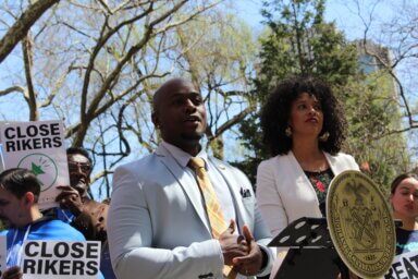 New York City Councilmember Kevin Riley speaks at a rally outside of City Hall on Tuesday, April 11, 2023, to advocate for the closure of Rikers Island.