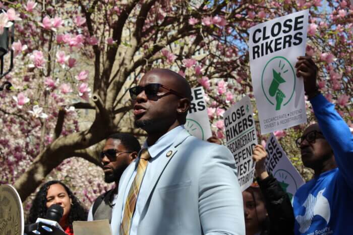 New York City Councilmember Kevin Riley speaks at a rally outside of City Hall on Tuesday, April 11, 2023, to advocate for the closure of Rikers Island.