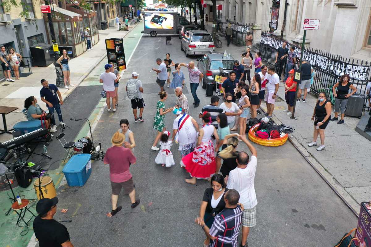 people dancing in the street