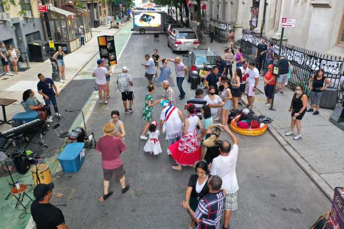 people dancing in the street