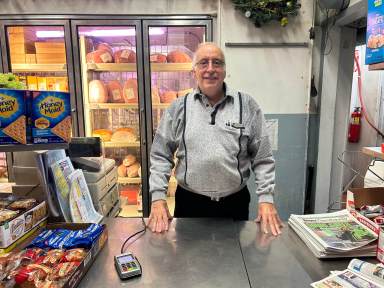 Carl Giordano, owner of Giordano's Big G, is pictured here at his store located in Morris Park.