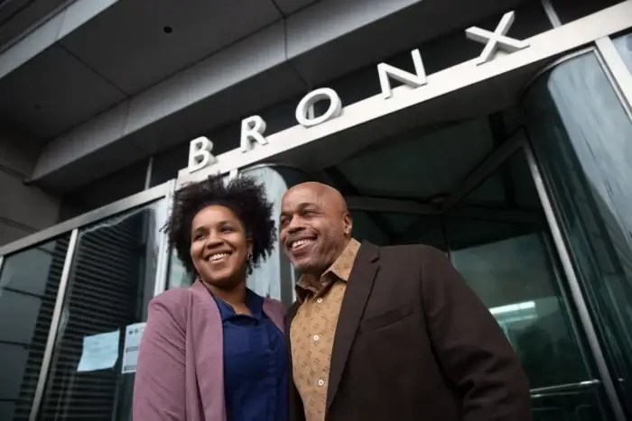 Norberto Peets celebrates with his daughter, Johanil, outside the Bronx courthouse, May 9, 2023.