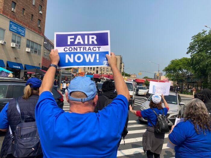 Cars honk their horns in support of UFT members at the union's rally in Parkchester on Wednesday, May 24, 2023.