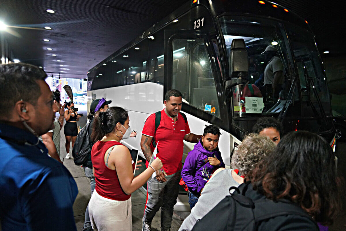 Migrants arrive at Port Authority bus terminal in August 2022.