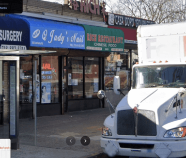 The abandoned infant was found near this nail salon on Eastchester Road near Mace Avenue