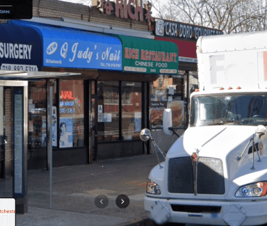 The abandoned infant was found near this nail salon on Eastchester Road near Mace Avenue
