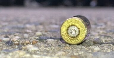 Police officers find the shell casing of a 9mm bullet after a shooting in the Crotona Park East section of the Bronx on Friday, June 16, 2023.