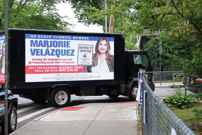 A truck campaigning for Marjorie Velazquez is parked on the corner of Pelham Parkway South and Hone Avenue during the New York City Primary Election on Tuesday, June 27, 2023. 