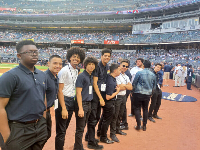 The eight-piece power pop band is made up of local students from All Hallows High School, located on East 164 Street in the Bronx just three blocks away from Yankee Stadium. 