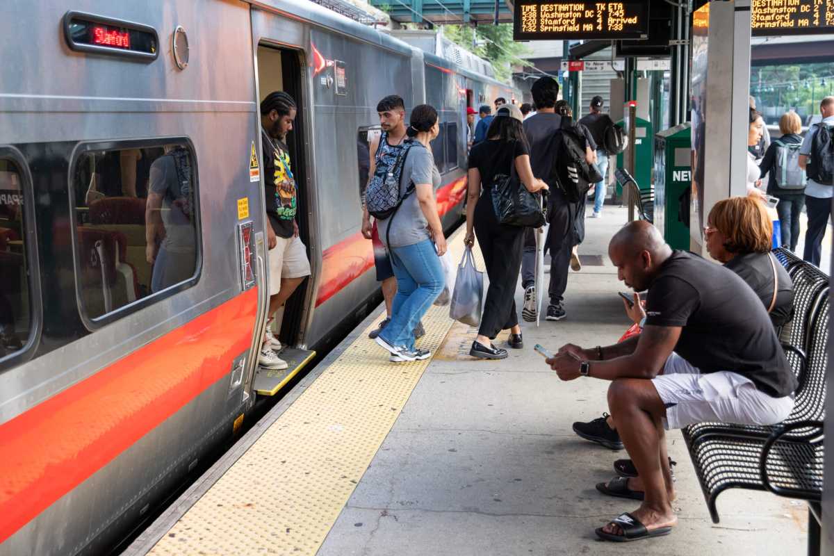 Metro North train platform passengers in New Rochelle Stamford New Haven line