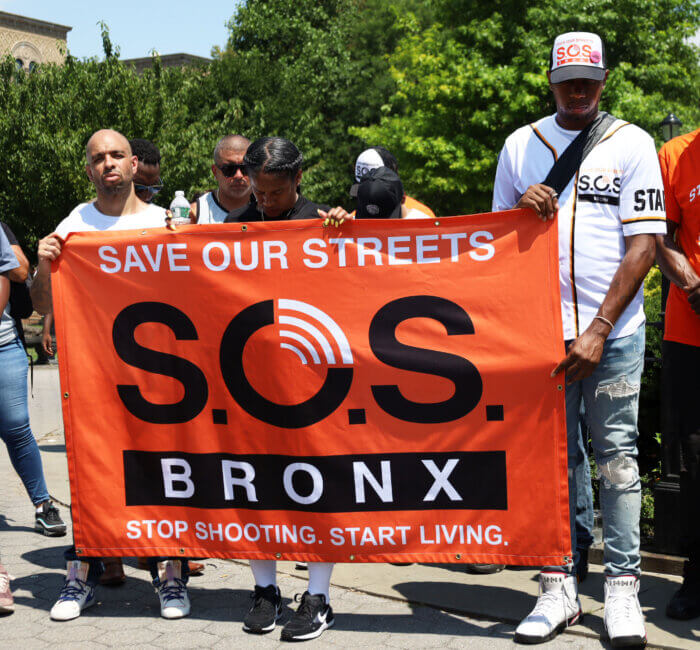 Representatives from the Save Our Streets project attend a a press conference in Joyce Kilmer Park on July 6, 2023.