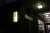 sign lit up at night says 50th precinct
