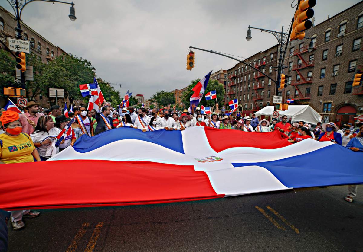 New Yorkers march in the 2021 Dominican Day Parade.