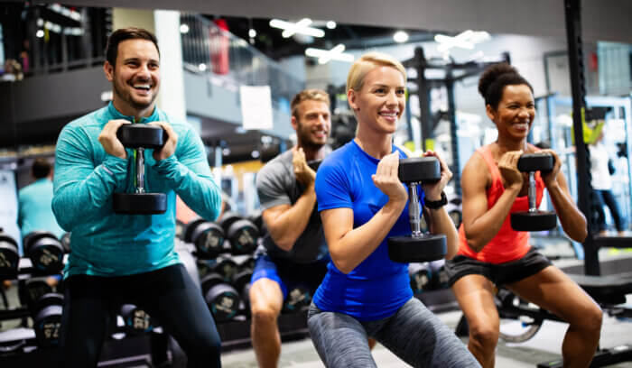 Sports medicine physician and IronStrength founder Dr. Jordan Metzl is teaching a 30 minute strength class followed by a Zumba class taught by YMCA fitness instructor Eric Flemmings on Aug. 5, 2023.