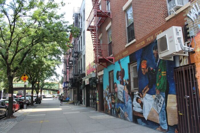 Murals are seen along Alexander Avenue near Mott Haven's Ghetto Film School on Monday, Aug. 21, 2023.