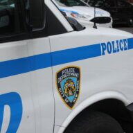 Police cars are parked outside the 40th NYPD Precinct in Mott Haven on Monday, Aug. 21, 2023.