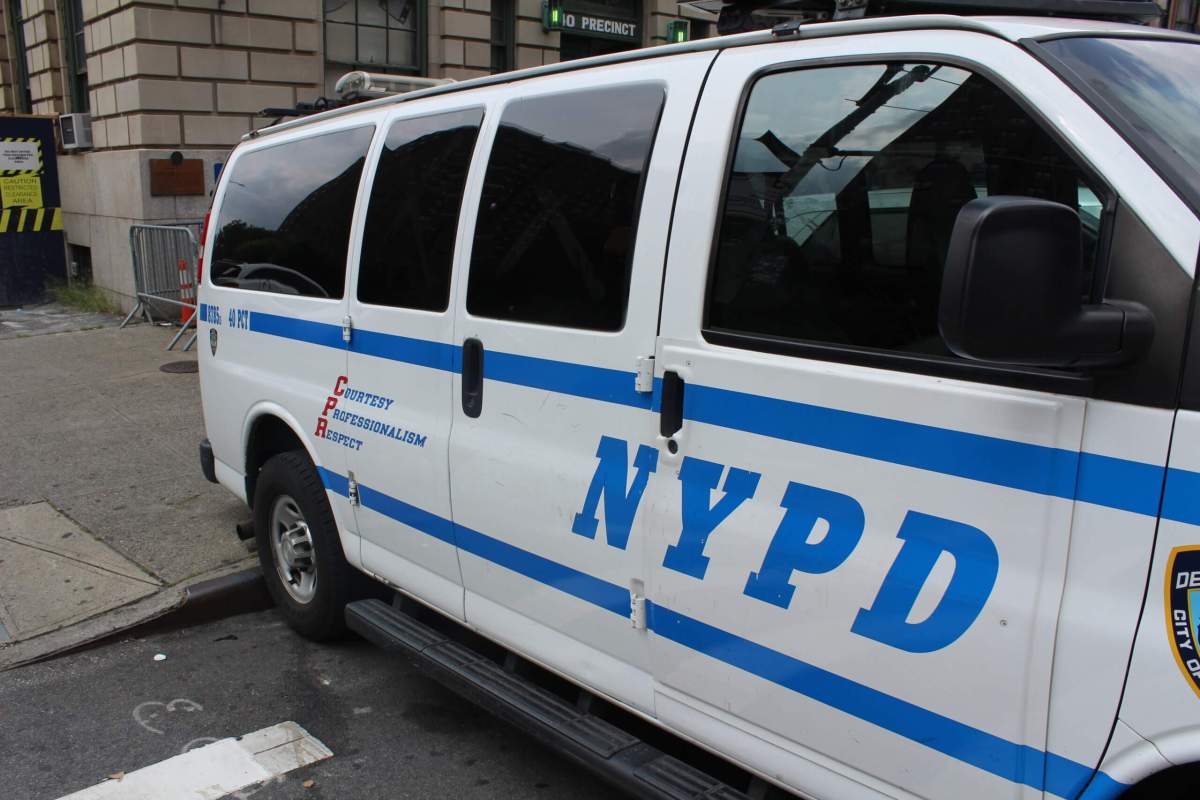 Police cars are parked outside the 40th NYPD Precinct in Mott Haven on Monday, Aug. 21, 2023.