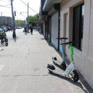 Lime scooters are parked on Gun Hill Road in the Bronx on Tuesday, July 25, 2023.