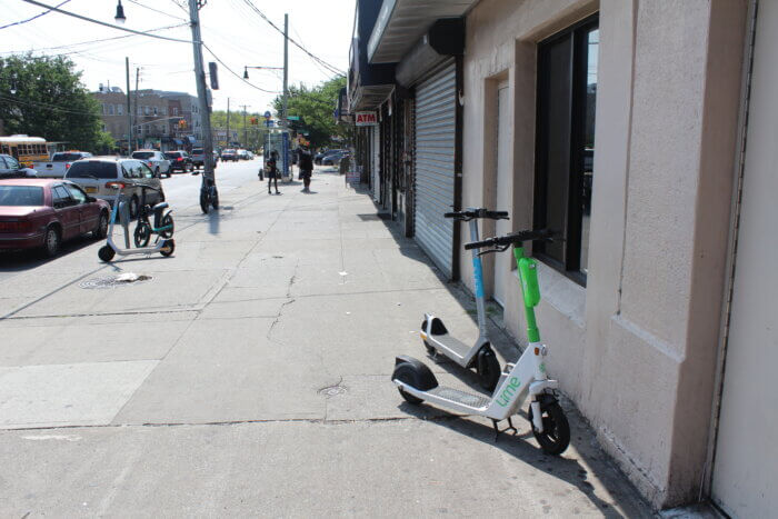 Lime scooters are parked on Gun Hill Road in the Bronx on Tuesday, July 25, 2023.