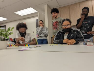 Students collaborated in high-tech and low-tech ways to create their original video game. Photo Other Possible Games staff