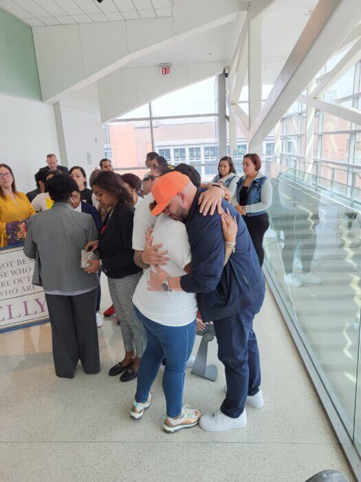 Members of Angellyh Yambo's family comfort each other after the Sept. 15 sentencing. Photo Emily Swanson 