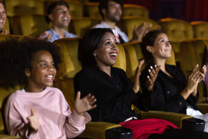 stock photo of people clapping in an audience