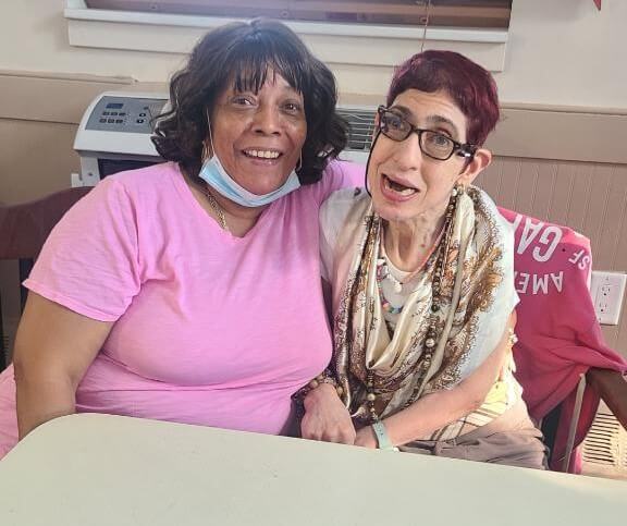Maggie Wainwright is pictured with Geralyn Peragine, who lives at AHRC New York City’s Agovino residence in the Bronx.