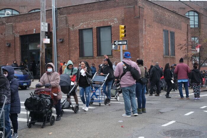 Lines of people cover the entire street block during the annual giveaway, many waiting hours to receive their bags of food. Assembly Member Kenny Burgos emphasized how these lines have only grown within the nine years that this giveaway has been held. “It's a pretty chilly day. I always tell folks, people will not wait outside in cold weather for an hour or two unless they really have to. So (it) really just exemplifies a need that we have in the area,” said Burgos.