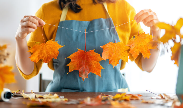 Woman doing autumn decor