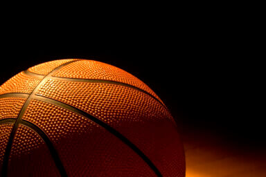 Close up of basketball in low light