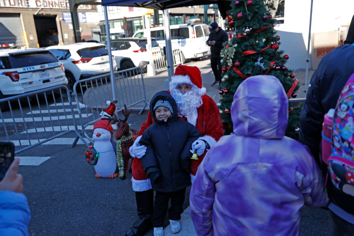 Santa Poses with Child