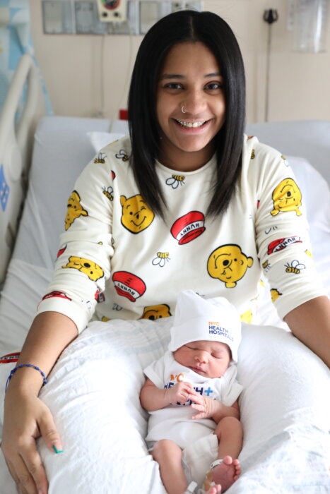 Baby Boy Saint Pizarro, born at 8:26am on January 1st. Saint weighed in at 6 lbs, 8.1 ounces and 19.69 inches. He is pictured in this photo with his loving mother, Tabitha.