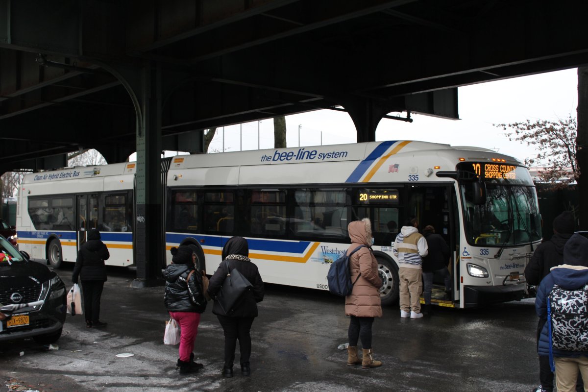 People board the Bee-Line in Norwood on Tuesday, Jan. 23, 2024.