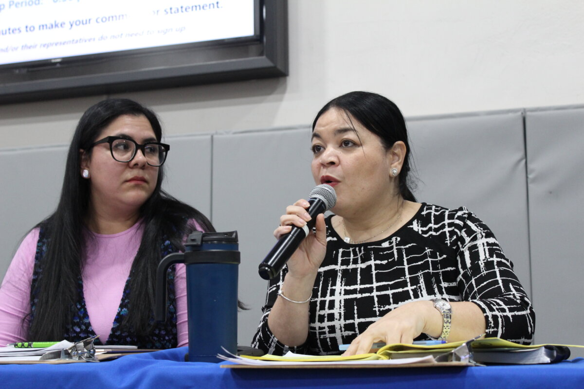 ronx Community Board 7 Chair Yajaira Arias, right, speaks alongside District Manager Karla Cabrera-Carrera during the body's full meeting on Tuesday, Jan. 23, 2023 at Monroe College.