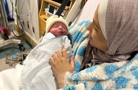 Fatima Alshawabkeh is pictured with her newborn Adam Alshawabkeh, who was born at Montefiore's Jack D. Weiler Hospital on Jan. 1, 2024.