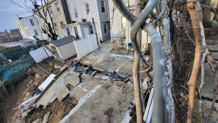 A retaining wall that collapse in Tremont on Wednesday, Jan. 10, 2024 damaged five residential properties and three commercial buildings on the block.