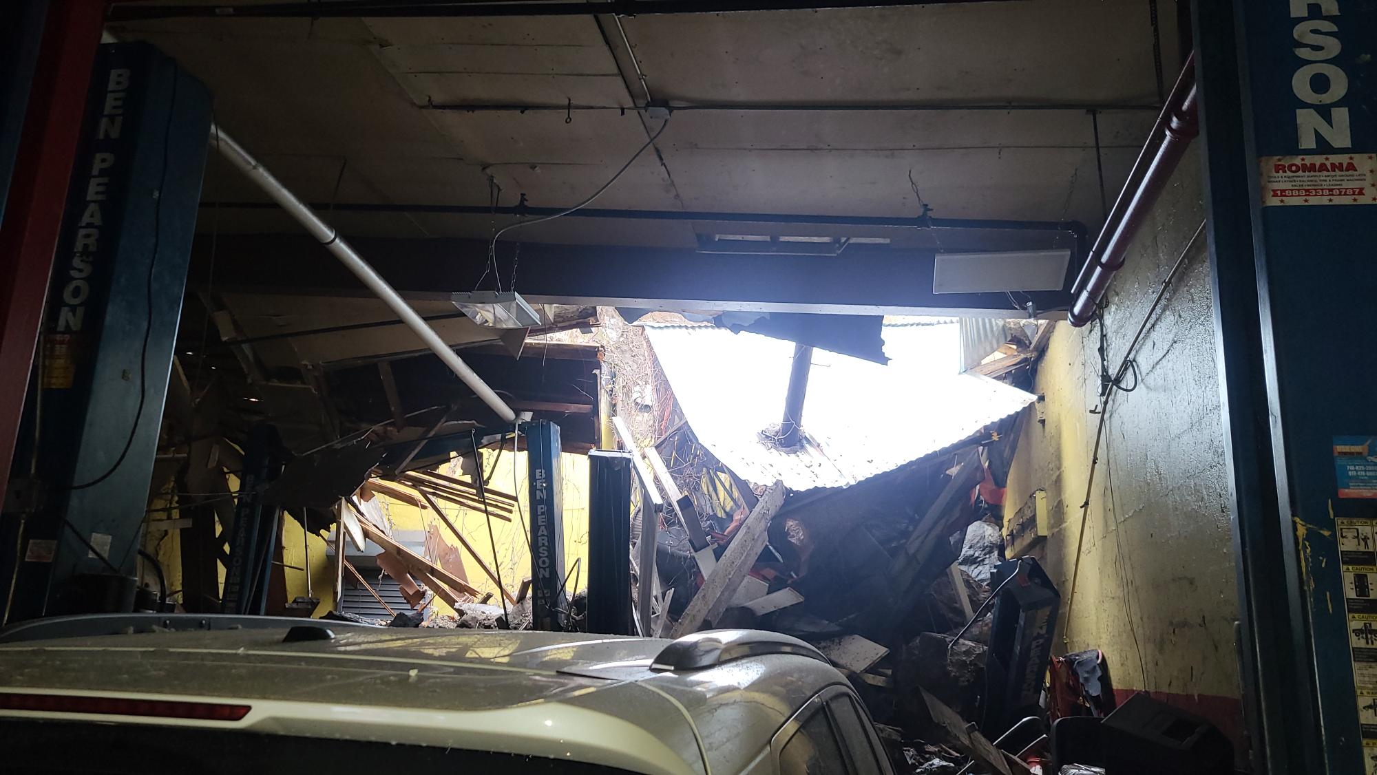 Carter Auto Repair in the Tremont section of the Bronx sustained significant damage when a retaining wall collapse on Wednesday, Jan. 10, 2024.