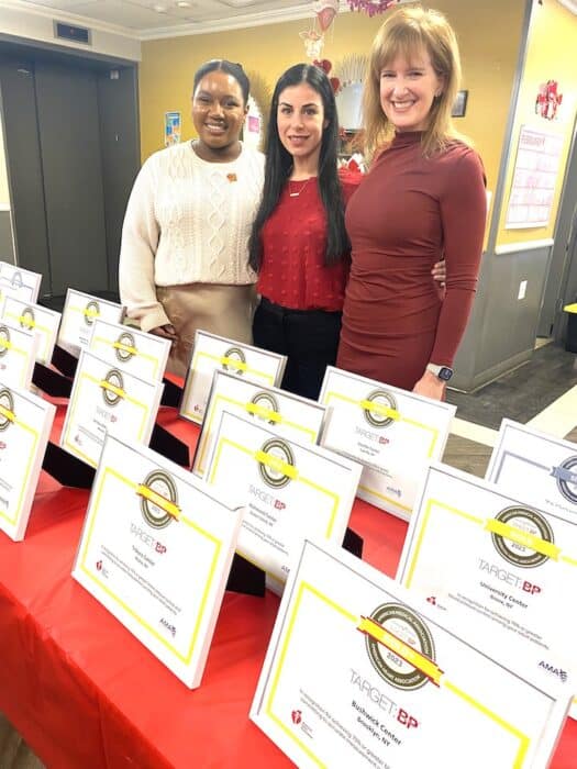 In front of Target: BP Plaques table are (L-R) AHA’s Saraswathi Cuffey, Centers Health Care’s Meagan Grillo-Zinke, and AHA’s Robin Vitale.