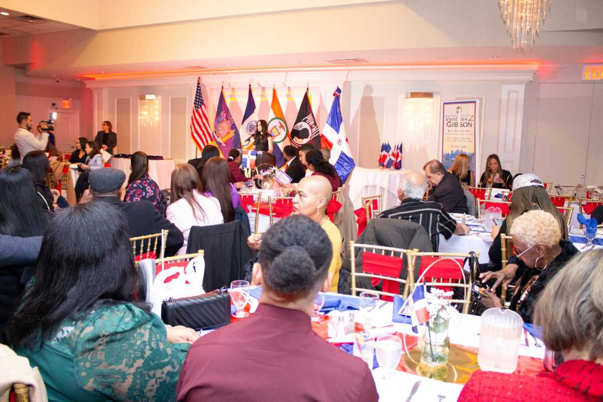 Yeila Lluberes, anchor at Univision 41 and the event's Mistress of Ceremonies, speaks to attendees.