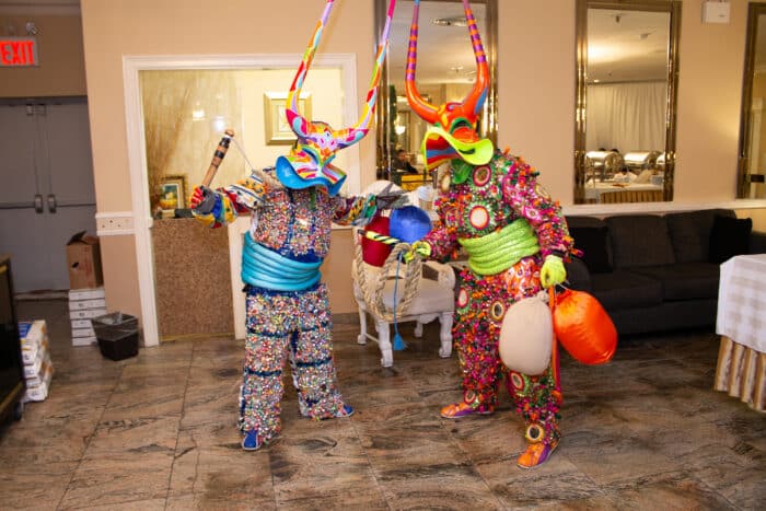 Los Andulleros Carnival of Santiago, a Dominican carnival group in New York, were also present to perform.