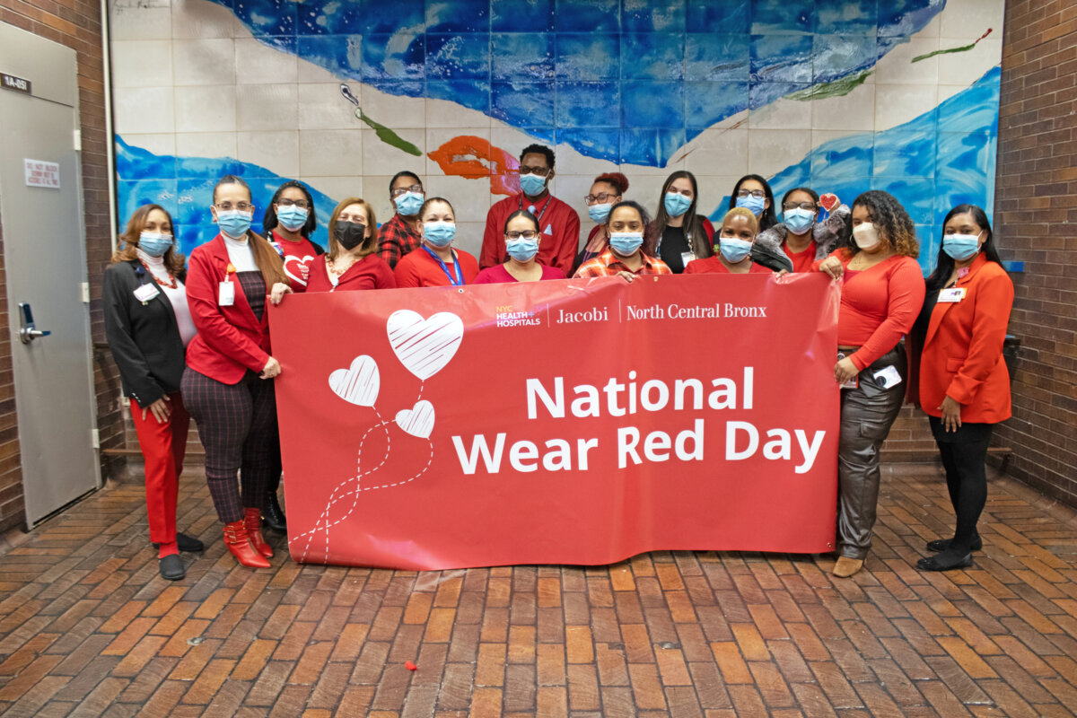 Staff members at NYC Health + Hospitals North Central Bronx hold the National Wear Red Day banner and wearing red in support of this day inside the hospital. This was done to help raise awareness for cardiovascular disease in women.