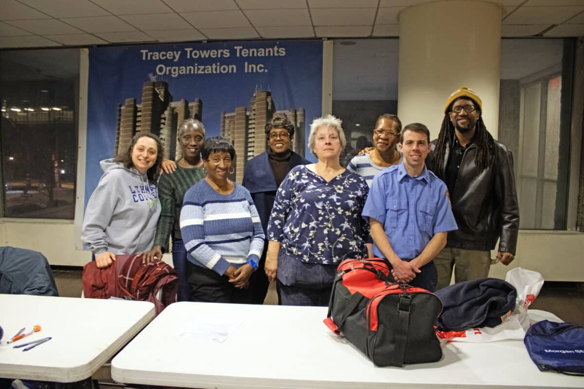 A group photo with some of Bronx Community Board 7 members and Ralph Puglier from the FDNY Fire Safety Education Unit.