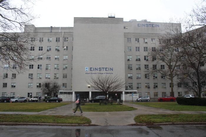 A person walks by the Albert Einstein College of Medicine one the NYC Health + Hospitals Jacobi campus on Friday, Feb. 2, 2024.