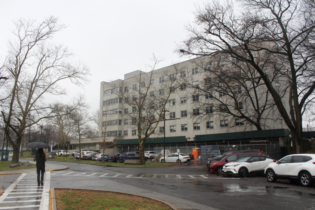 A person walks by 900 Seminole Ave., the site of the proposed Just Home project, on the NYC Health + Hospitals Jacobi campus on Friday, Feb. 2, 2024.