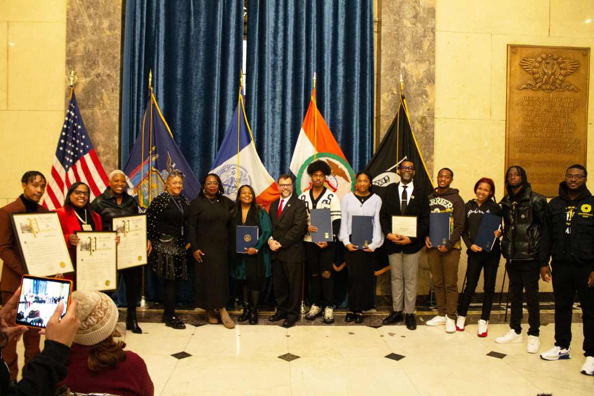 Local officials and representatives Gina Williams, Bronx Borough public advocate; NYC Councilmember Althea Stevens and Senator Luis Sepulveda stand with some of the honorees.