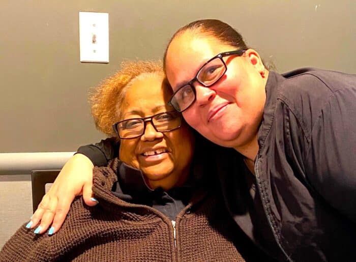 Bronx woman Nuris Cevallos (left) smiles with Centers Health Care staff member Jazmin Escobar at the Bronx Center. Cevallos has been in rehabilitation there since December, where she has been determined to improve her heart health.
