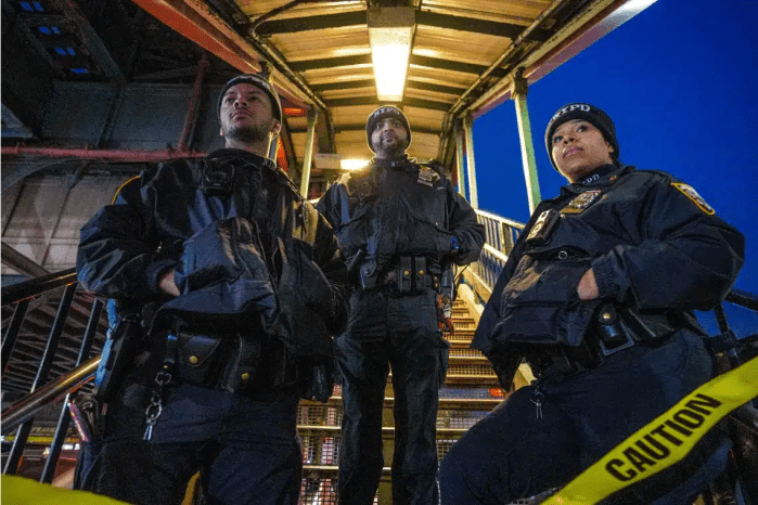 The NYPD responds to a subway shooting on the 4 train on Monday, Feb. 12, 2024.