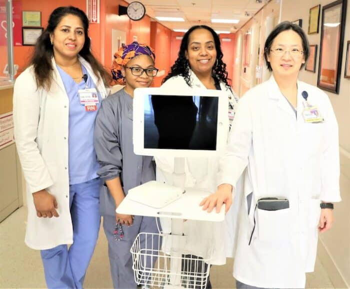 Staff at the North Central Bronx hospital pose for a photo.