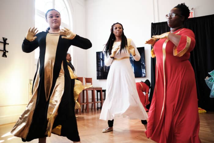 Dancers fill the front of the room during the Black Girl Magic: Economic Empowerment event in the South Bronx on Saturday, March 16, 2024.