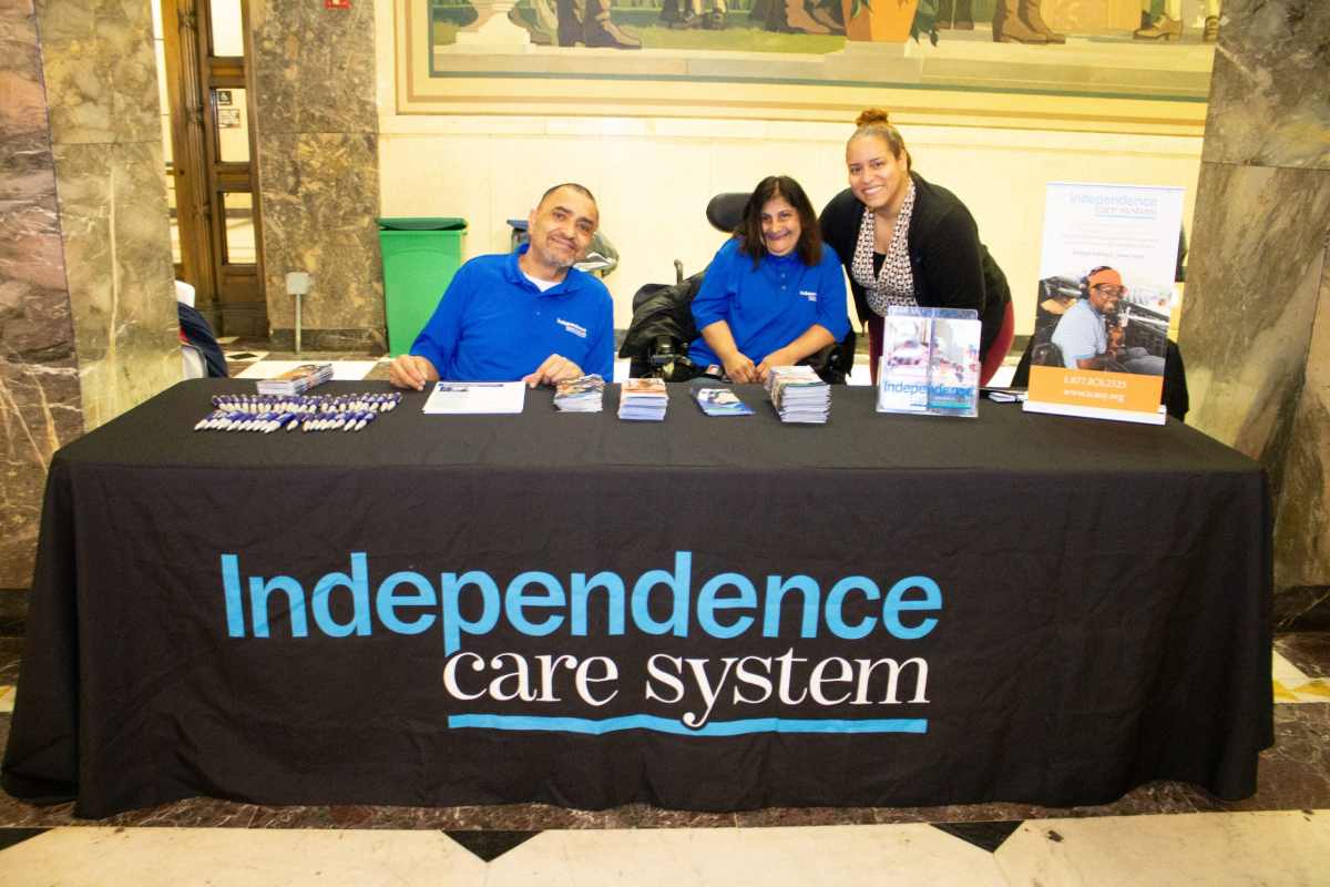 There were many tables available to assist community members with disabilities at the Disability Advisory Council Meet and Greet inside Bronx Borough Hall. The Independence Care System was in attendance. In this photo are ICS members Esteban Santos and Mercedes De La Cruz, the manager of community engagement at the Independence Care System table.